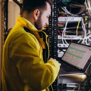 Young man engineer making program analyses